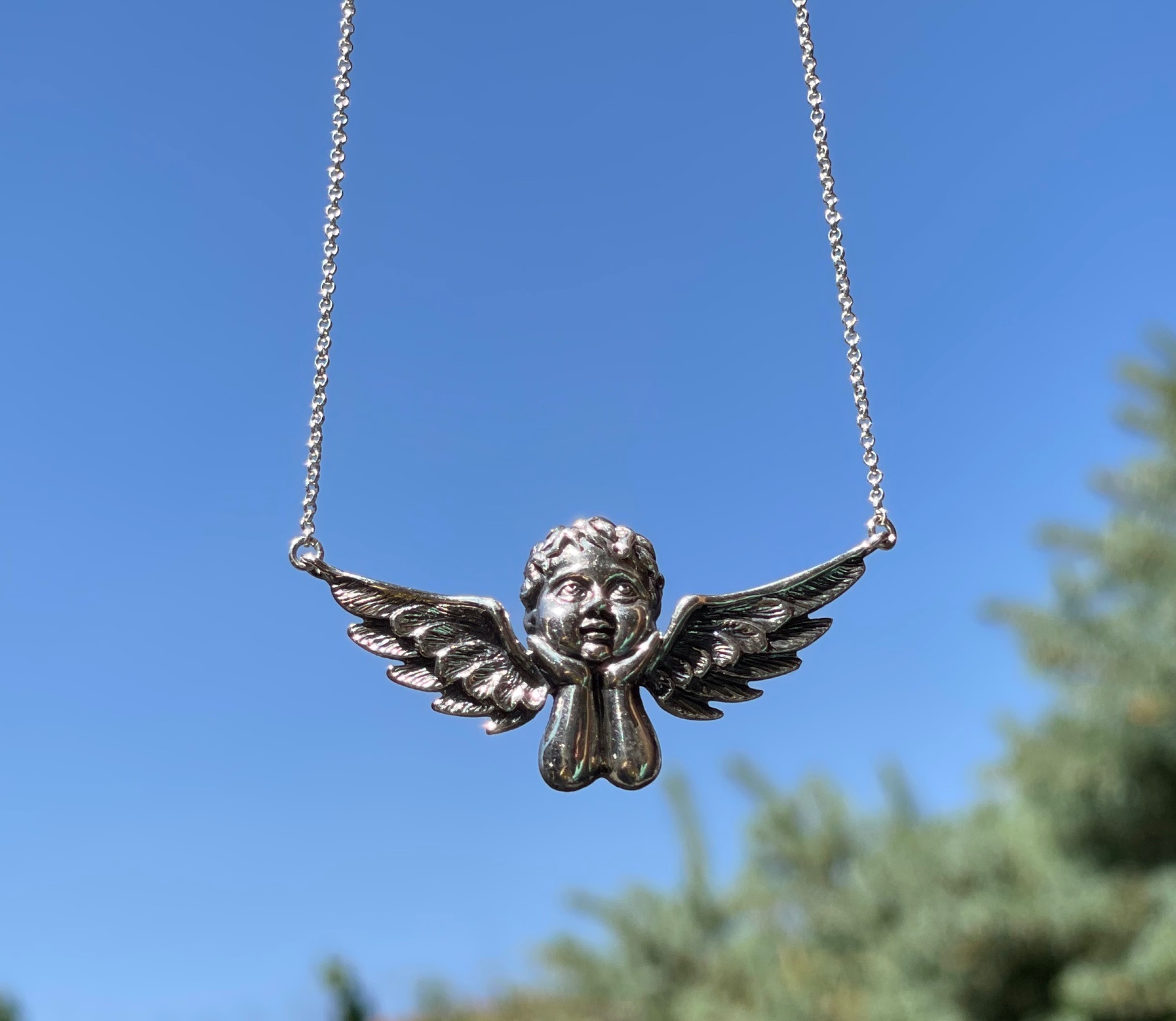 Baby angel necklace silver hotsell
